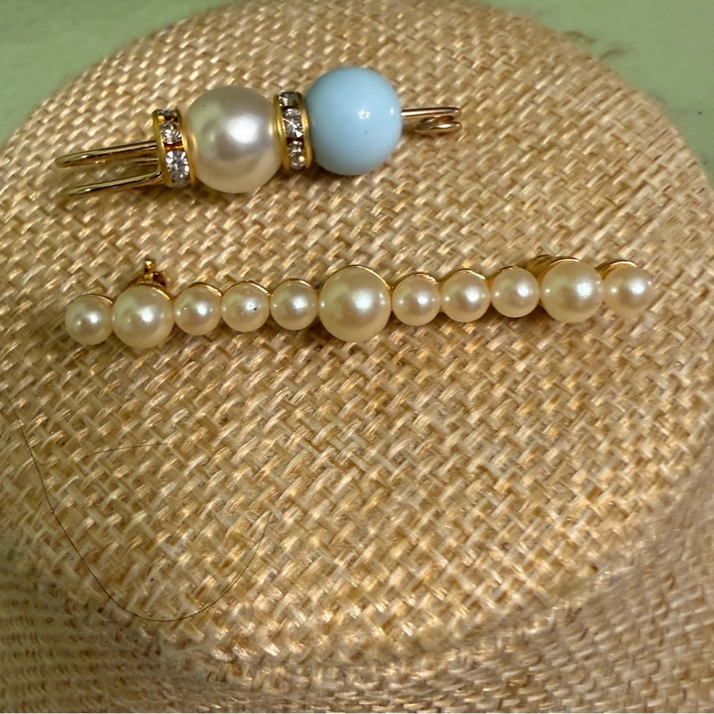 Elegant Pearl and Gold Brooches
